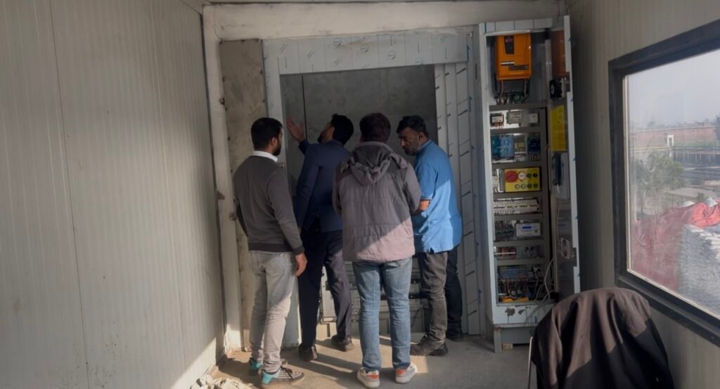 Mechano Elevator installation team working on elevator shaft