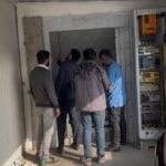 Mechano Elevator installation team working on elevator shaft